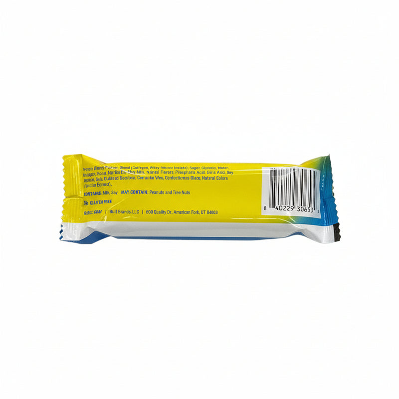 Yellow and blue candy bar wrapper with text and a barcode on a white background