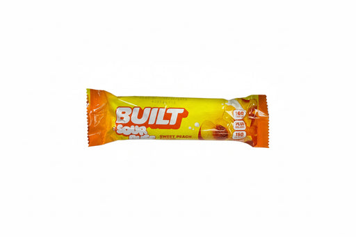 Yellow and orange Built Sour Sweet Peach candy bar packaging on a white background