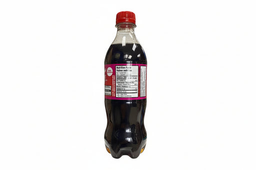 Soda bottle with a red cap and label on a white background
